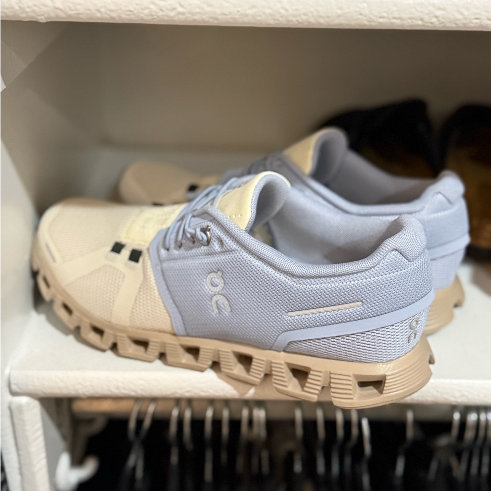 On Running Cream and Light Blue Sneakers